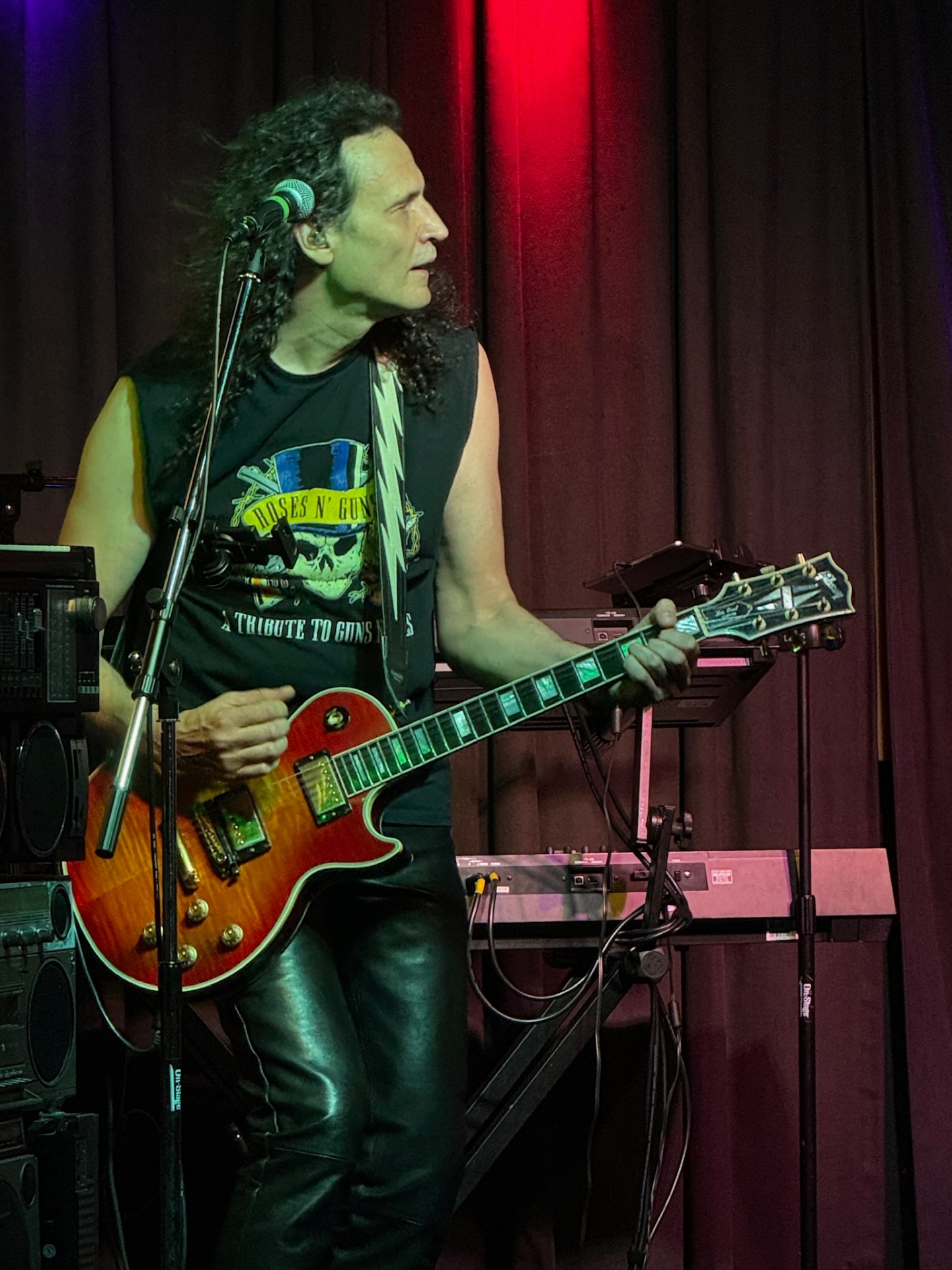 Aure of GEMS shredding guitar at a live cover band show